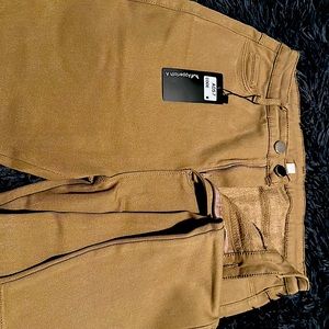 Khaki high waisted stretch pants.